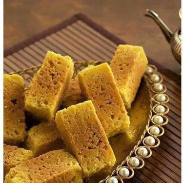 https://cdn.shopify.com/s/files/1/1857/6931/products/mysore_pak_B_280610_c33ddd9b-6983-41db-bbf2-78bd05cf85de.jpg?v=1716963535